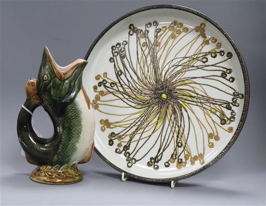 A Royal Copenhagen 1960s Fajance circular dish by Ellen Malmer and a Continental majolica fish vase, Dish diameter 33cm